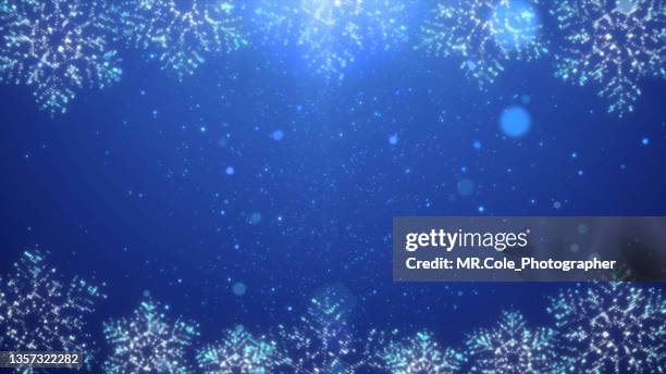 motion graphic of christmas decoration background, snowflakes on the frame with glittering  particles and lens flare for christmas and celebration event - blue christmas background stock pictures, royalty-free photos & images