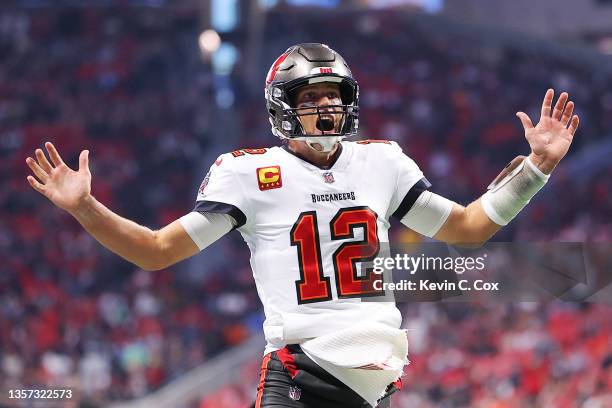 Tom Brady of the Tampa Bay Buccaneers reacts after a touchdown against the Atlanta Falcons during the first quarter at Mercedes-Benz Stadium on...