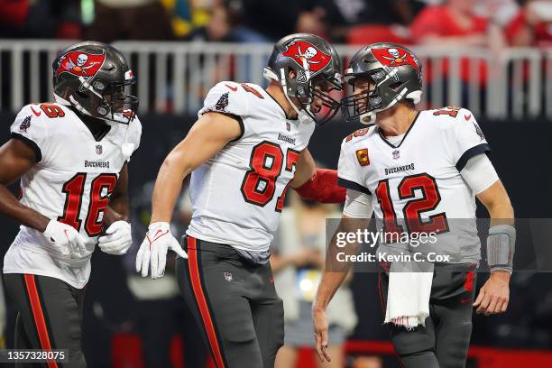 Rob Gronkowski of the Tampa Bay Buccaneers celebrates his touchdown against the Atlanta Falcons with teammate Tom Brady during the second quarter at...