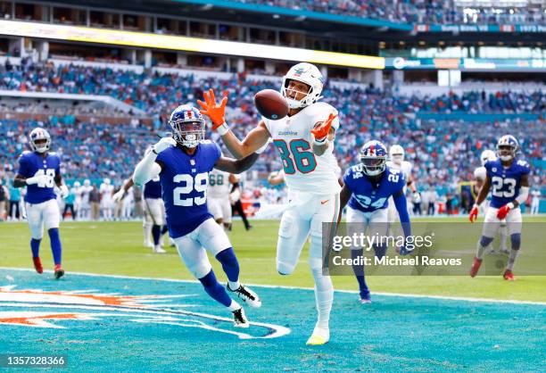 Mack Hollins of the Miami Dolphins makes a touchdown reception against the New York Giants in the second quarter at Hard Rock Stadium on December 05,...