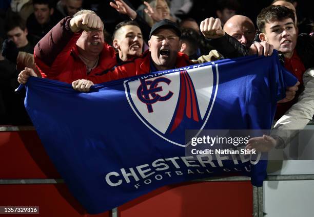 Chesterfield fans celebrate during the Emirates FA Cup Second Round match between Salford City and Chesterfield FC on December 05, 2021 in Salford,...