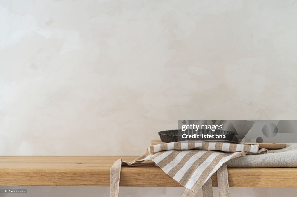 Clean home environments. Linen table cloth, kitchen apron and baking pan