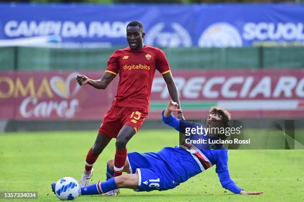 Roma player Ndiaye Maissa Codou competes with UC Sampdoria player Marco Bontempi during the Primavera 1 match between AS Roma U 19 and UC Sampdoria U...