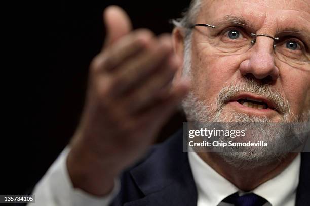 Former MF Global Chairman and CEO Jon Corzine testifies before the Senate Agriculture, Nutrition and Forestry Committee about the demise and...