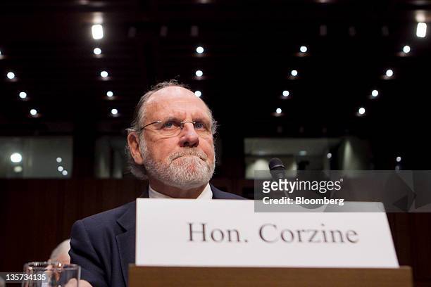 Jon S. Corzine, former chairman and chief executive officer of MF Global Holdings Ltd., prepares to testify at a Senate Agriculture Committee hearing...