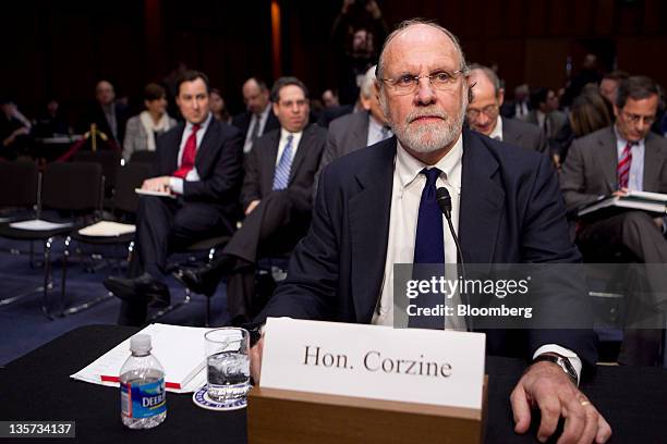 Jon S. Corzine, former chairman and chief executive officer of MF Global Holdings Ltd., waits to testify at a Senate Agriculture Committee hearing in...