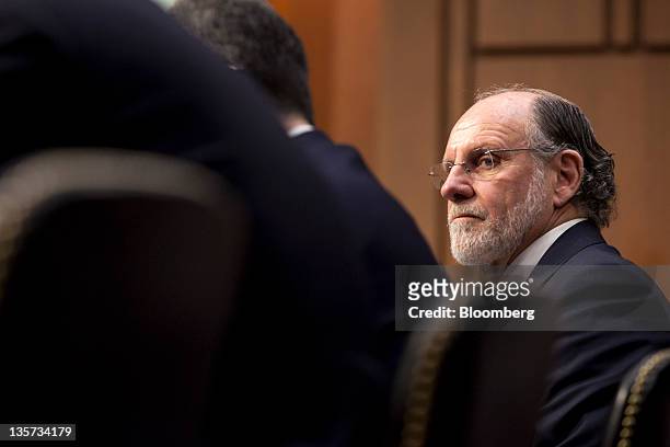 Jon S. Corzine, former chairman and chief executive officer of MF Global Holdings Ltd., listens during a Senate Agriculture Committee hearing in...