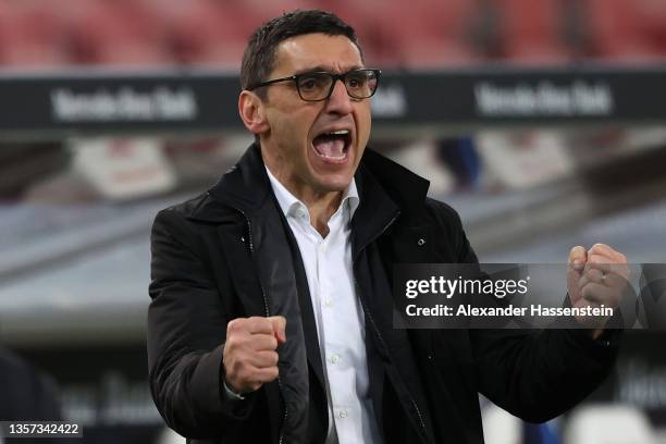 Tayfun Korkut, Head Coach of Hertha Berlin celebrates their sides second goal scored by Stevan Jovetic during the Bundesliga match between VfB...