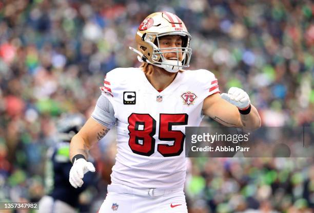 George Kittle of the San Francisco 49ers celebrates after catching the ball for a touchdown during the first quarter against the Seattle Seahawks at...