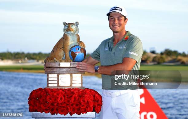 Viktor Hovland of Norway poses with the trophy after winning the Hero World Challenge at Albany Golf Course on December 05, 2021 in Nassau, .