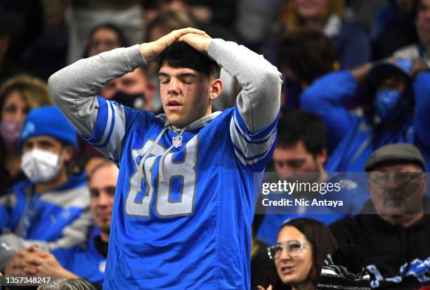 Detroit Lions fan reacts in the stands after a fumble by Jared Goff during the fourth quarter against the Minnesota Vikings at Ford Field on December...