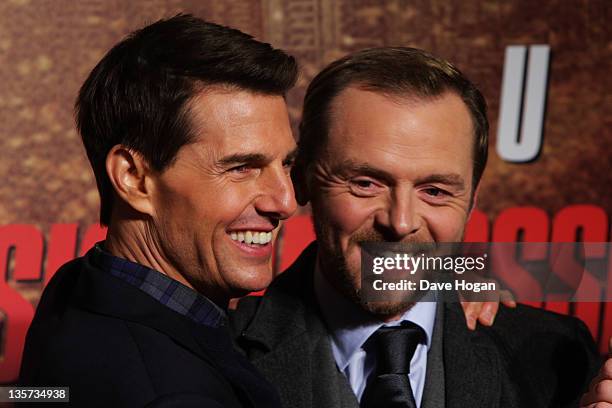 Tom Cruise and Simon Pegg attend the UK Premiere of Mission: Impossible Ghost Protocol at The BFI IMAX on December 13, 2011 in London, United Kingdom.