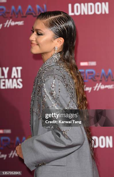 Zendaya attends a photocall for "Spiderman: No Way Home" at The Old Sessions House on December 05, 2021 in London, England.