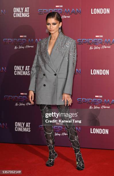 Zendaya attends a photocall for "Spiderman: No Way Home" at The Old Sessions House on December 05, 2021 in London, England.