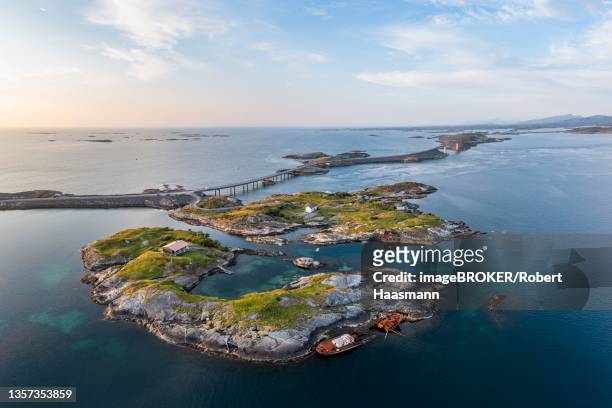 small islands and shipwreck along the atlantic strait, aerial view, atlanterhavsveien, moere og romsdal, norway - more og romsdal county stock pictures, royalty-free photos & images