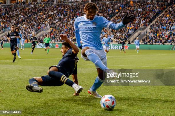 Nathan Harriel of Philadelphia Union and Tayvon Gray of New York City FC challenge for possession during the second half during the MLS Eastern...