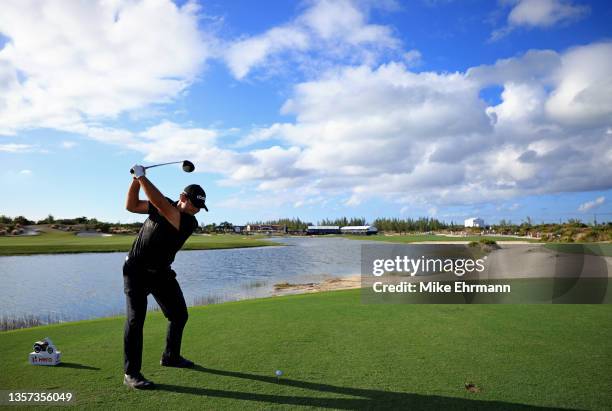 Patrick Reed of the United States hits his tee shot on the 18th hole during the final round of the Hero World Challenge at Albany Golf Course on...