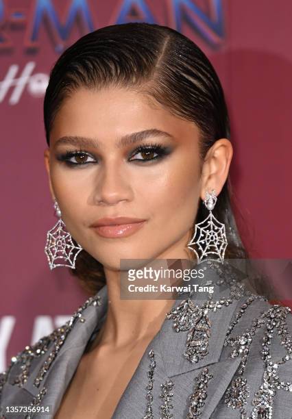 Zendaya attends a photocall for "Spiderman: No Way Home" at The Old Sessions House on December 05, 2021 in London, England.