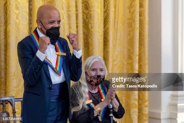 Berry Gordy and Joni Mitchell, Kennedy Center honorees, are hosted at a reception in the East Room at the White House on December 05, 2021 in...