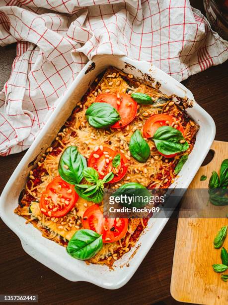 vegan lasagna au gratin - taken on mobile device stock pictures, royalty-free photos & images