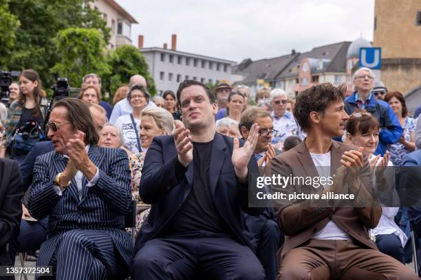 June 2023, Hesse, Frankfurt/M.: Dominik Elstner , son of Hannelore Elsner, and Florian David Fitz , actor, attend the inauguration of Hannelore...