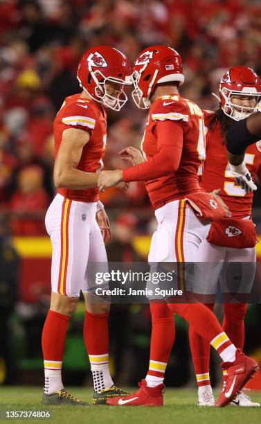 Harrison Butker of the Kansas City Chiefs is congratulated by teammate James Winchester after making a 56-yard field goal against the Denver Broncos...