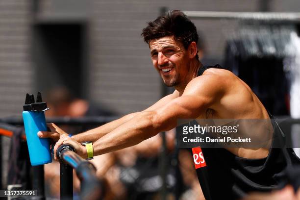 Scott Pendlebury of the Magpies looks on during a Collingwood Magpies AFL training session at Holden Centre on December 06, 2021 in Melbourne,...