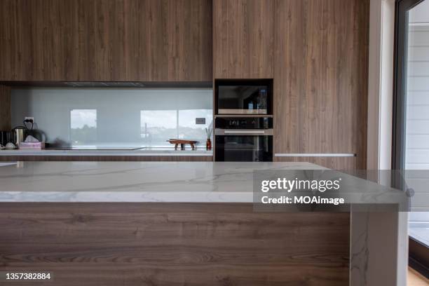 simple modern stylish kitchen - modern kitchen worktop stock pictures, royalty-free photos & images