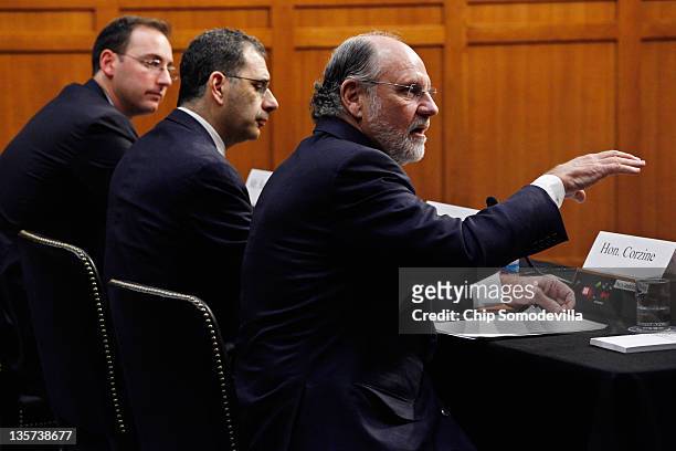 Former MF Global Chairman and CEO Jon Corzine, former President and COO Bradley Abelow and former CFO Henri Steenkamp testify before the Senate...
