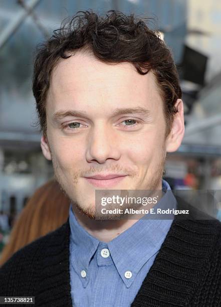 Actor Anton Yelchin attends a hand and footprint ceremony Immortalizing The Smurfs at Grauman's Chinese Theatre on December 13, 2011 in Hollywood,...