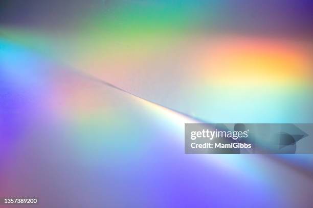 hologram color  paper reflects rainbow colors - hologram stock pictures, royalty-free photos & images