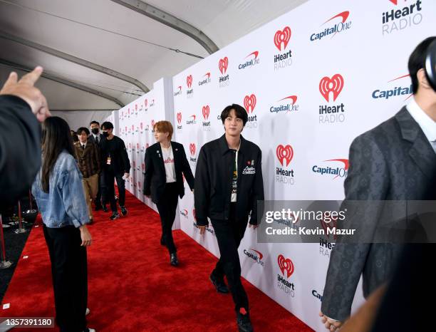 Suga, Jin, and Jungkook of BTS attends iHeartRadio 102.7 KIIS FM's Jingle Ball 2021 presented by Capital One at The Forum on December 03, 2021 in Los...