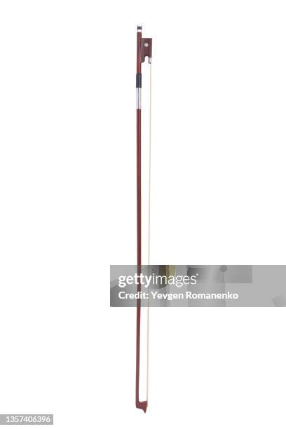 a violin bow isolated on white background - arco equipo musical fotografías e imágenes de stock