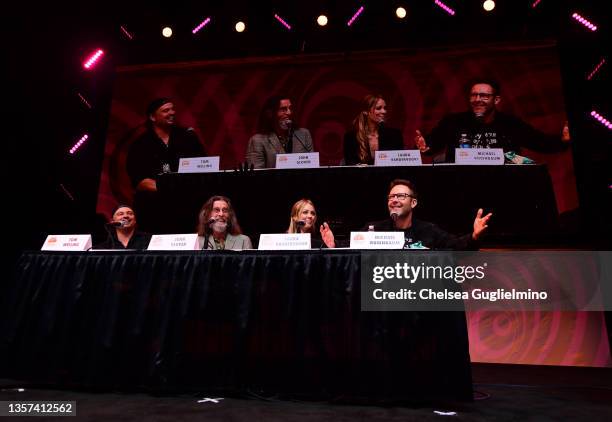 Actors Tom Welling, John Glover, Laura Vandervoort and Michael Rosenbaum speak during the "Smallville" panel at 2021 Los Angeles Comic Con at Los...