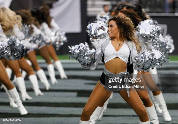 Members of the Las Vegas Raiderettes cheerleading squad perform during the Raiders' game against the Washington Football Team at Allegiant Stadium on...