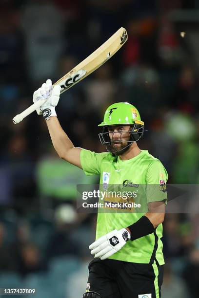 Alex Ross of the Thunder celebrates his half century during the Men's Big Bash League match between the Sydney Thunder and the Brisbane Heat at...