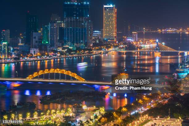 dragon bridge in da nang city - danang stock pictures, royalty-free photos & images
