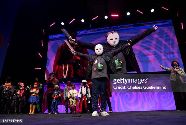 Cosplayer dressed as Jason Voorhees competes in the Kids Costume Contest during 2021 Los Angeles Comic Con at Los Angeles Convention Center on...