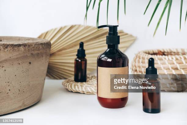 natural cosmetics for skincare, body and hair care. concept of natural cosmetic products. front view and close-up. bath accessories set for home. - shampoo per capelli foto e immagini stock