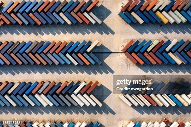 aerial view of truck trailers lined up in intermodal freight yard - global transportation stock pictures, royalty-free photos & images