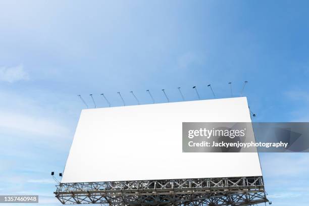 blank billboard at blue sky background - tradeshow template stock pictures, royalty-free photos & images