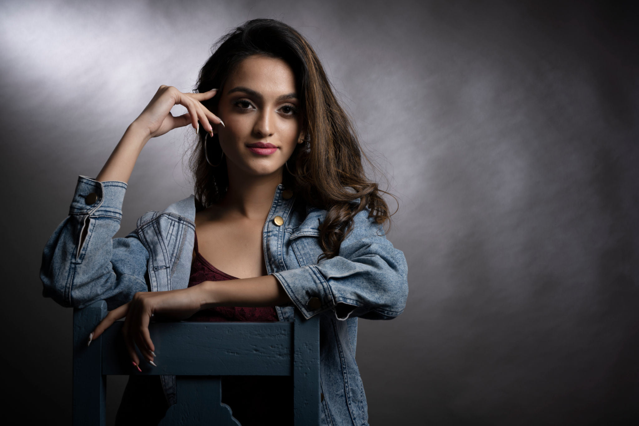 Young Indian female model wearing denim wear Young Indian female model wearing denim wear
