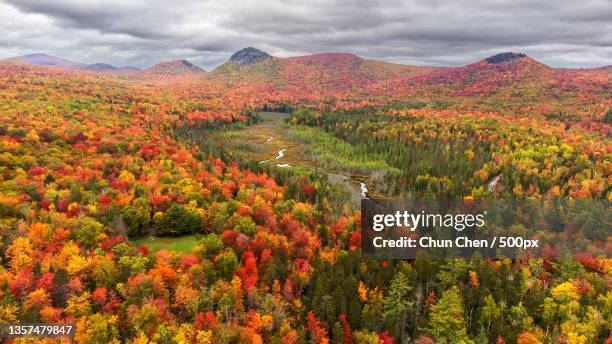 fall foliage at new england,scenic view of mountains against sky during autumn,groton,vermont,united states,usa - vermont stock pictures, royalty-free photos & images