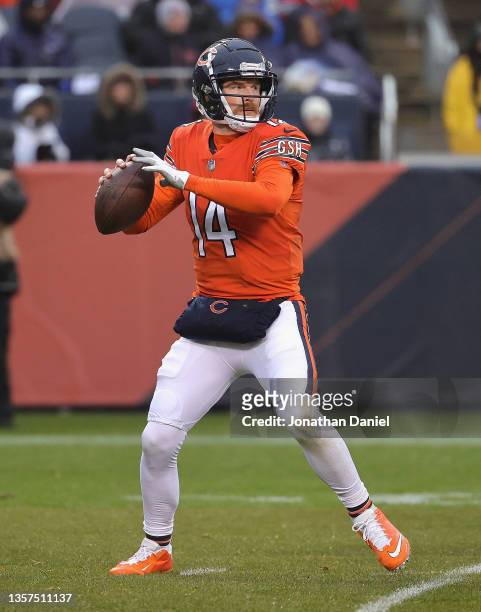Andy Dalton of the Chicago Bears looks for a receiver against the Arizona Cardinals at Soldier Field on December 05, 2021 in Chicago, Illinois. The...