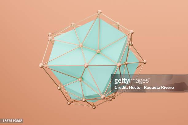 computer generated image of  green deformed cube with a mesh of particles on orange background - abstract object stock-fotos und bilder