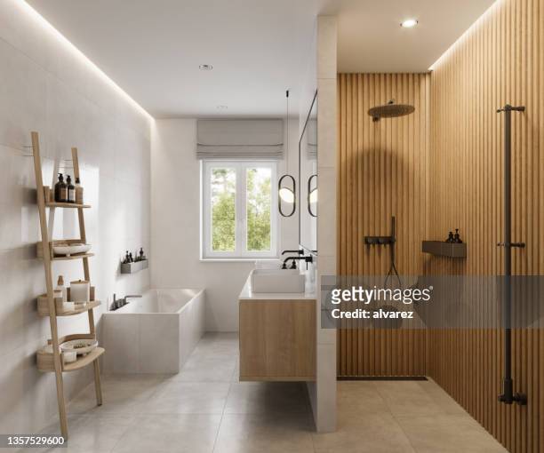 interior of a luxurious bathroom with shower area and bathtub in 3d - domestic bathroom stock pictures, royalty-free photos & images