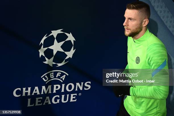 Milan Skriniar of FC Internazionale looks on during the FC Internazionale training session at Estadio Santiago Bernabeu on December 06, 2021 in...