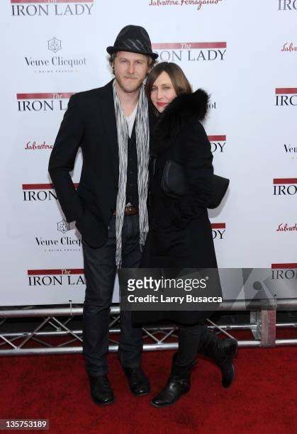 Renn Hawkey and Vera Farmiga attend the "The Iron Lady" New York premiere at the Ziegfeld Theater on December 13, 2011 in New York City.