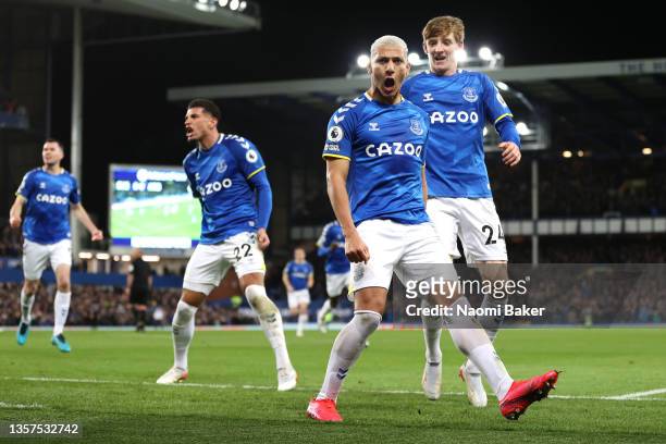 Richarlison of Everton celebrates with teammate Anthony Gordon after scoring a goal, that is later disallowed for offside during the Premier League...
