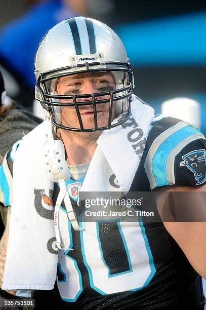 Jeremy Shockey of the Carolina Panthers sits on the sideline during the game against the Atlanta Falcons at Bank of America Stadium on December 11,...